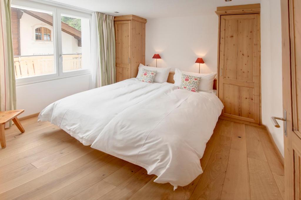 Postel nebo postele na pokoji v ubytování Apartments Styria
