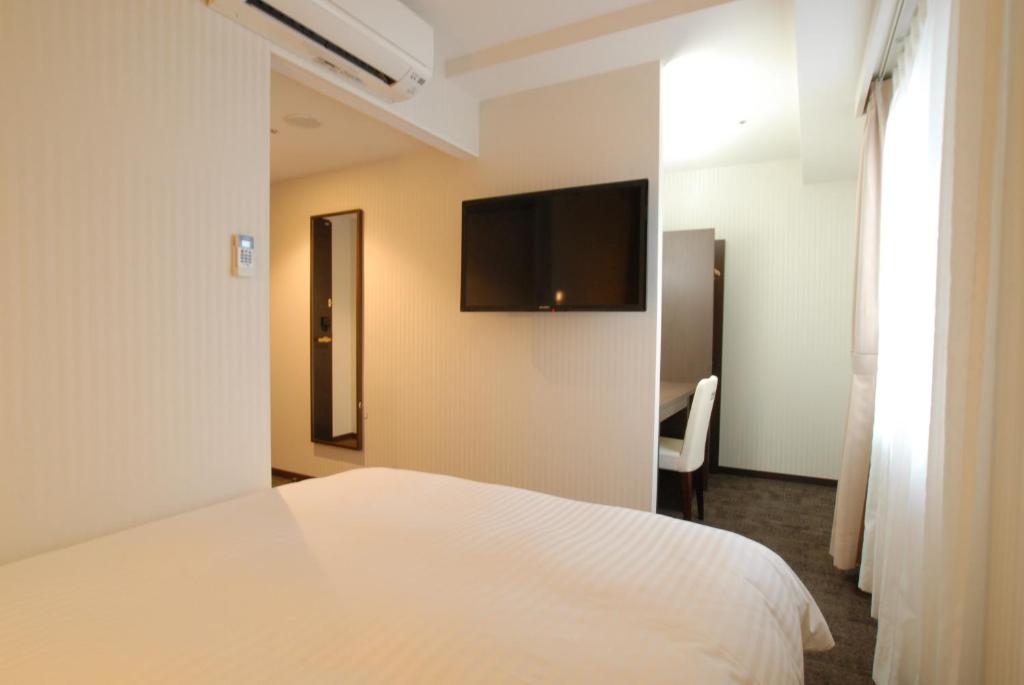 TV a/nebo společenská místnost v ubytování AB Hotel Kanazawa