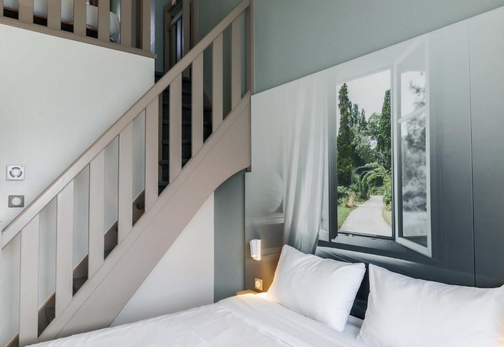 Postel nebo postele na pokoji v ubytování B&B HOTEL Nancy Frouard