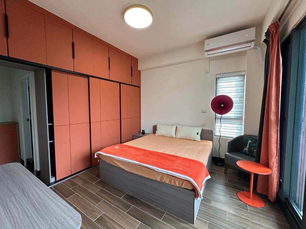 Postel nebo postele na pokoji v ubytování Life With Bird Homestay