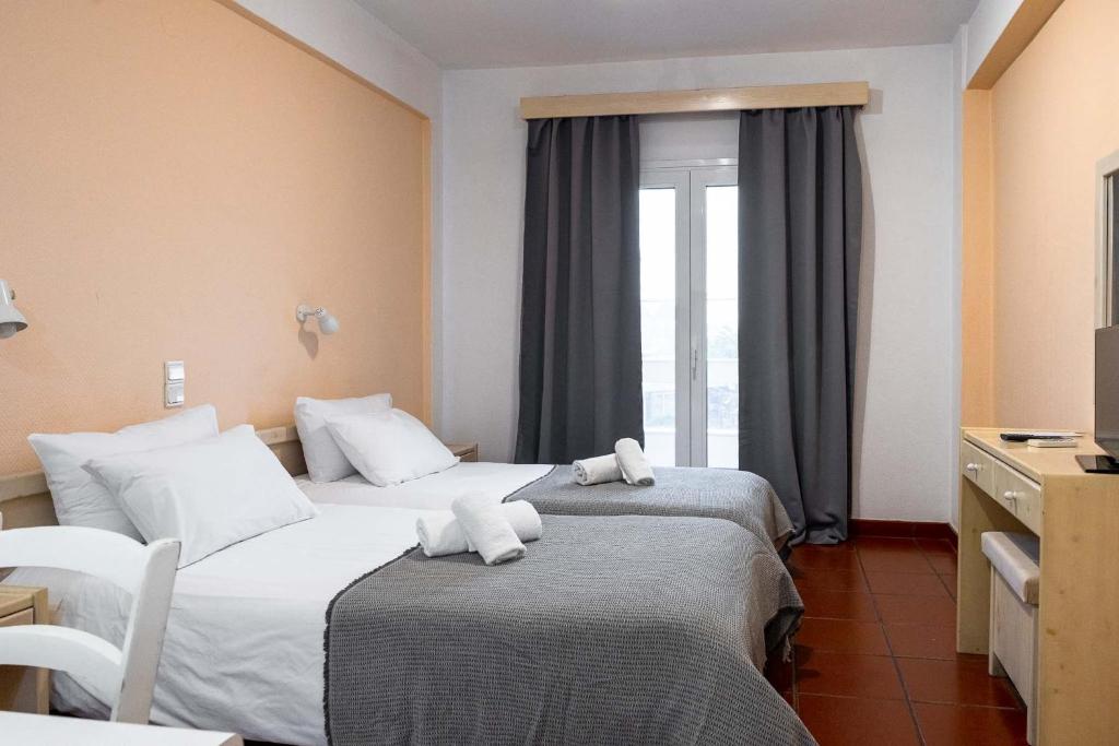 Postel nebo postele na pokoji v ubytování Scala Hotel