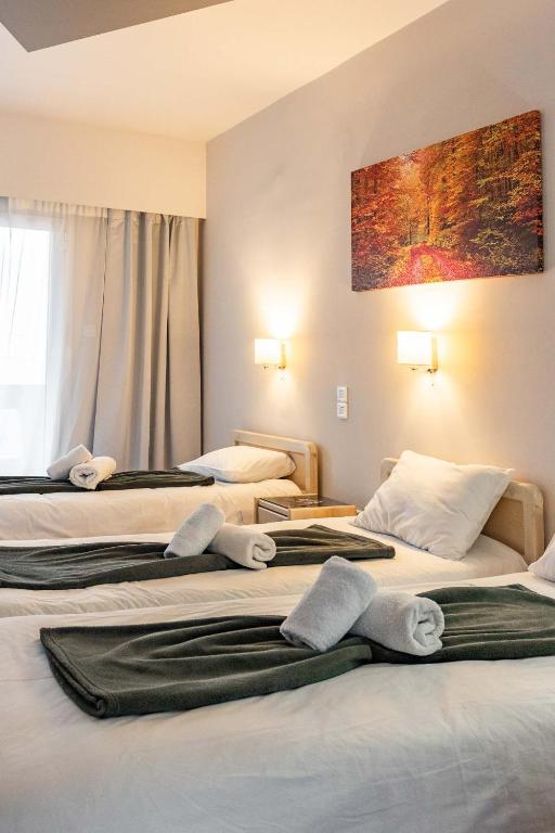 Postel nebo postele na pokoji v ubytování Scala Hotel