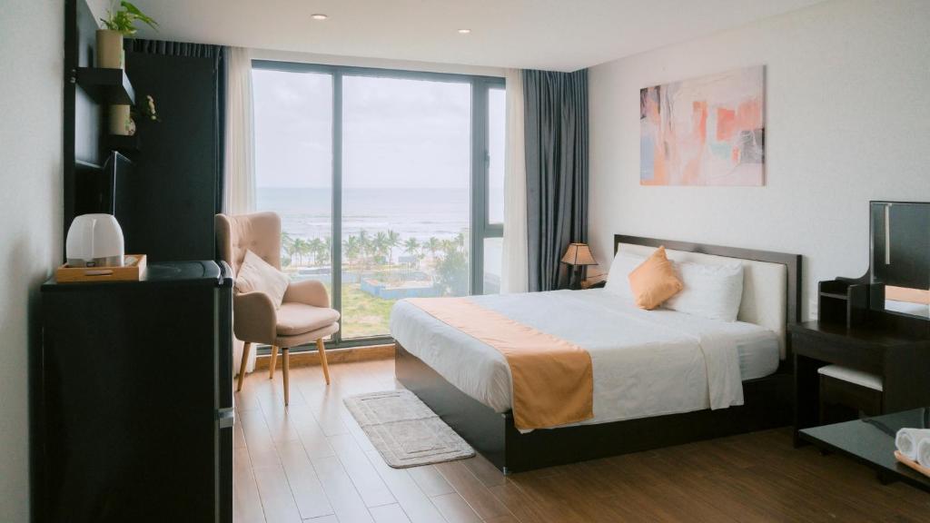 Postel nebo postele na pokoji v ubytování Horizon Front Beach Hotel Danang