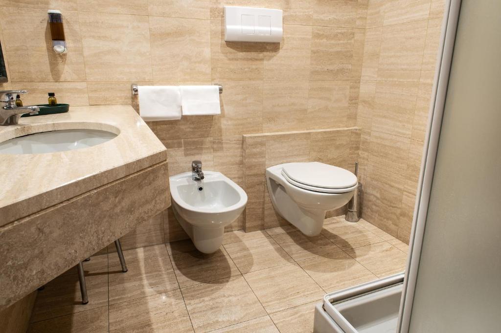 Koupelna v ubytování Hotel Alga