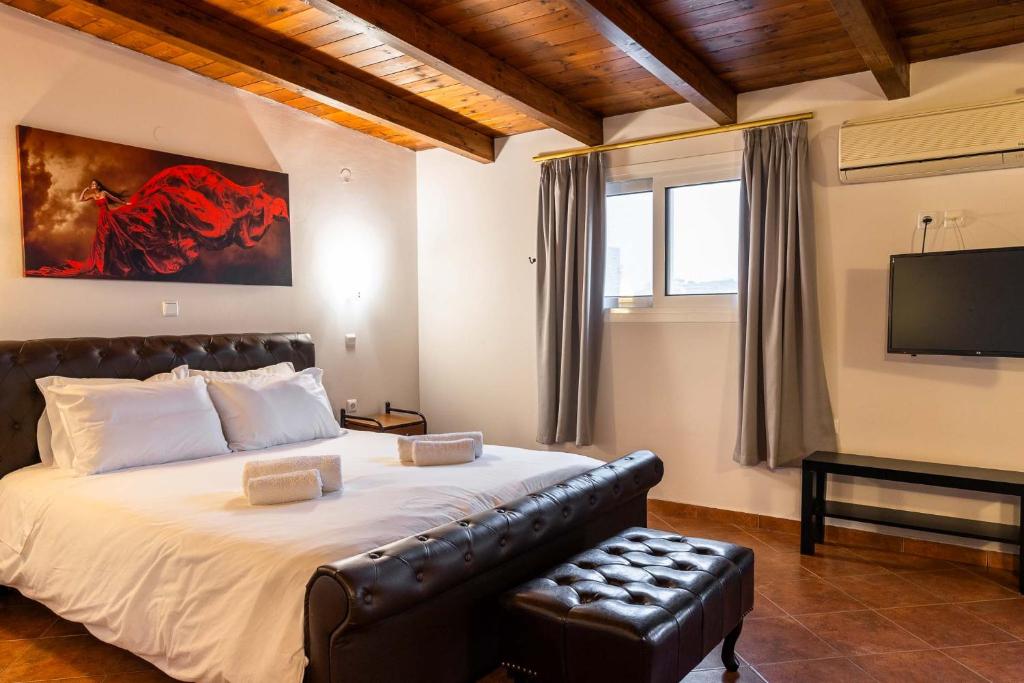 Postel nebo postele na pokoji v ubytování Scala Hotel