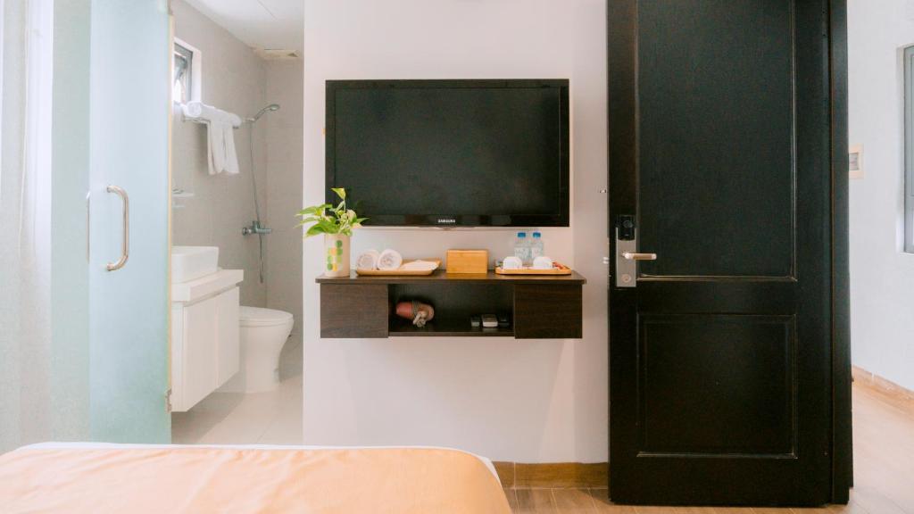 Postel nebo postele na pokoji v ubytování Horizon Front Beach Hotel Danang