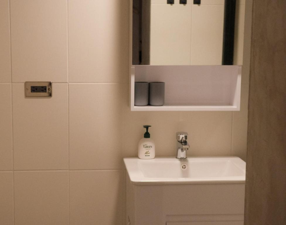 Koupelna v ubytování Yu Apartment