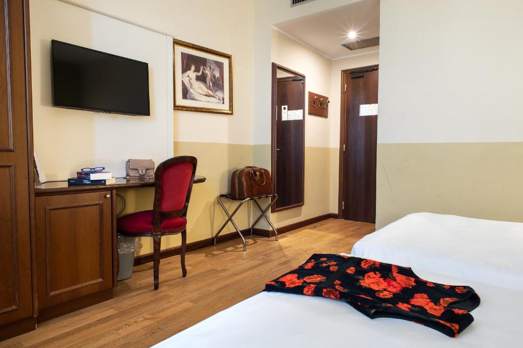 Postel nebo postele na pokoji v ubytování Hotel Alga