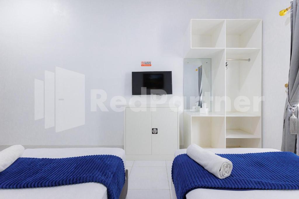 Sanama Kostel 2 Syariah Lampung RedPartner - Chambre Lits Jumeaux