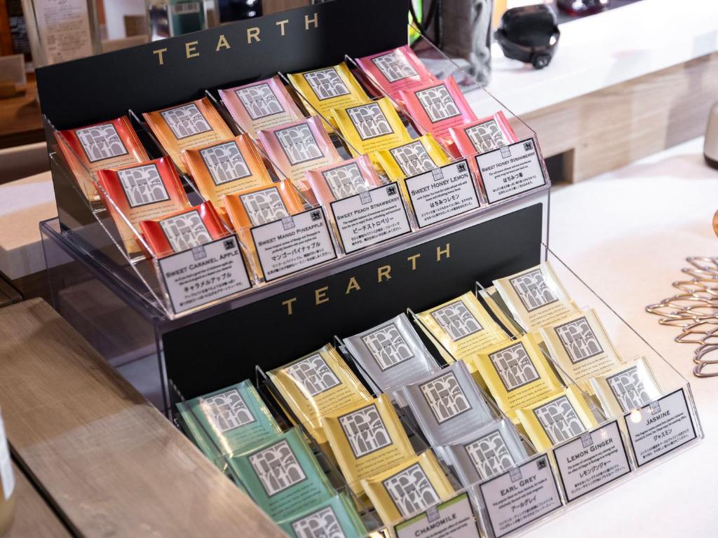 three boxes of hemp cigarettes on a table at SUPER HOTEL Ikebukuro West Natural Hot Spring in Tokyo