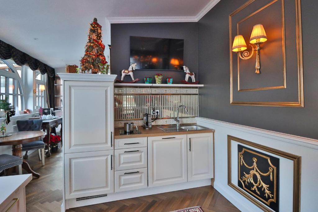 Kuchyň nebo kuchyňský kout v ubytování Schneider Hof Boutique-Hotel Garni Superior