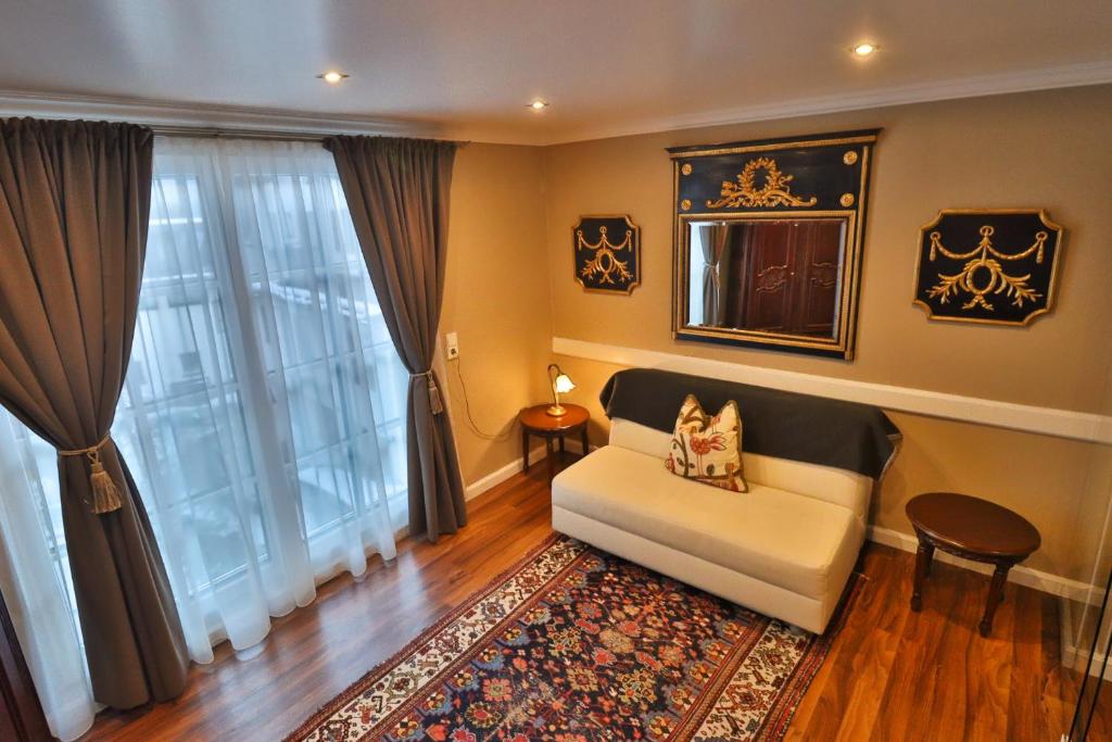 Postel nebo postele na pokoji v ubytování Schneider Hof Boutique-Hotel Garni Superior