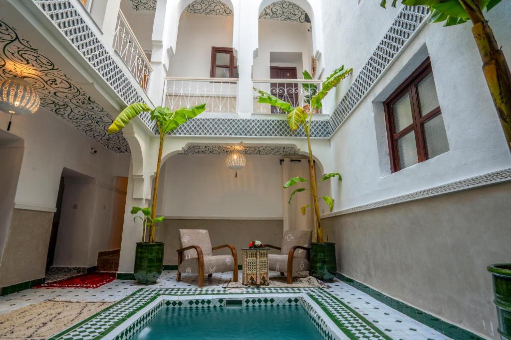 Bazén v ubytování Riad Les Dunes And SPA nebo v jeho okolí