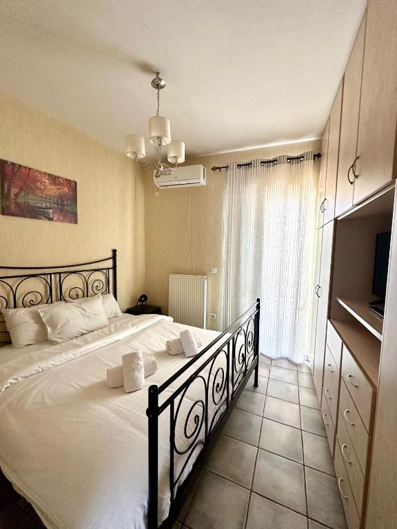 Posteľ alebo postele v izbe v ubytovaní Cozy Apartments Mc Queen