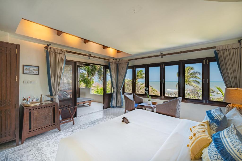 Postel nebo postele na pokoji v ubytování Aleenta Hua Hin - Pranburi - The Small Luxury Hotels of the World