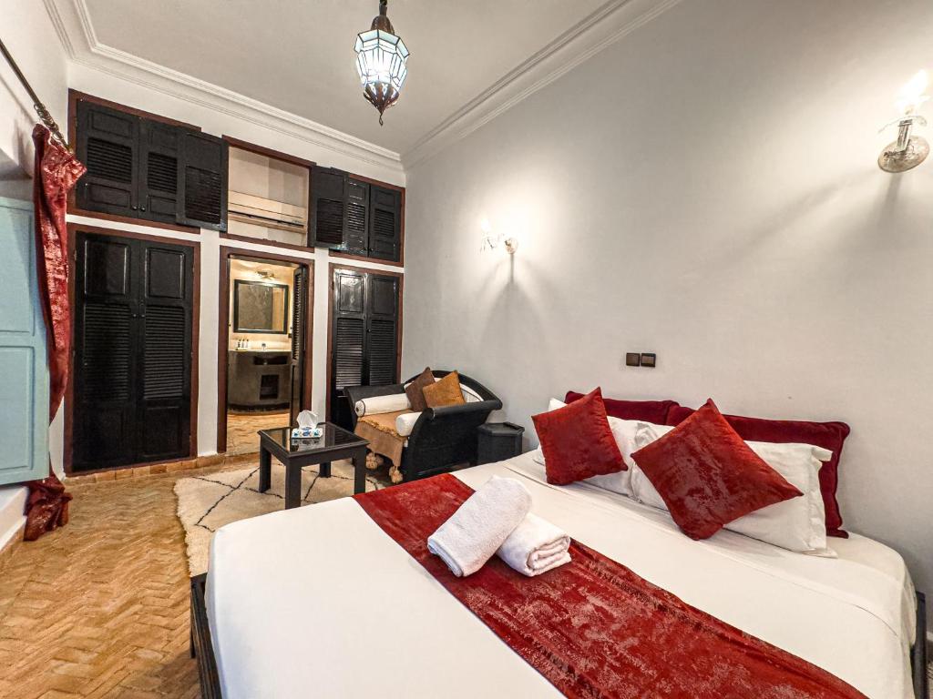 Postel nebo postele na pokoji v ubytování Riad L'Orchidée Suites & Spa