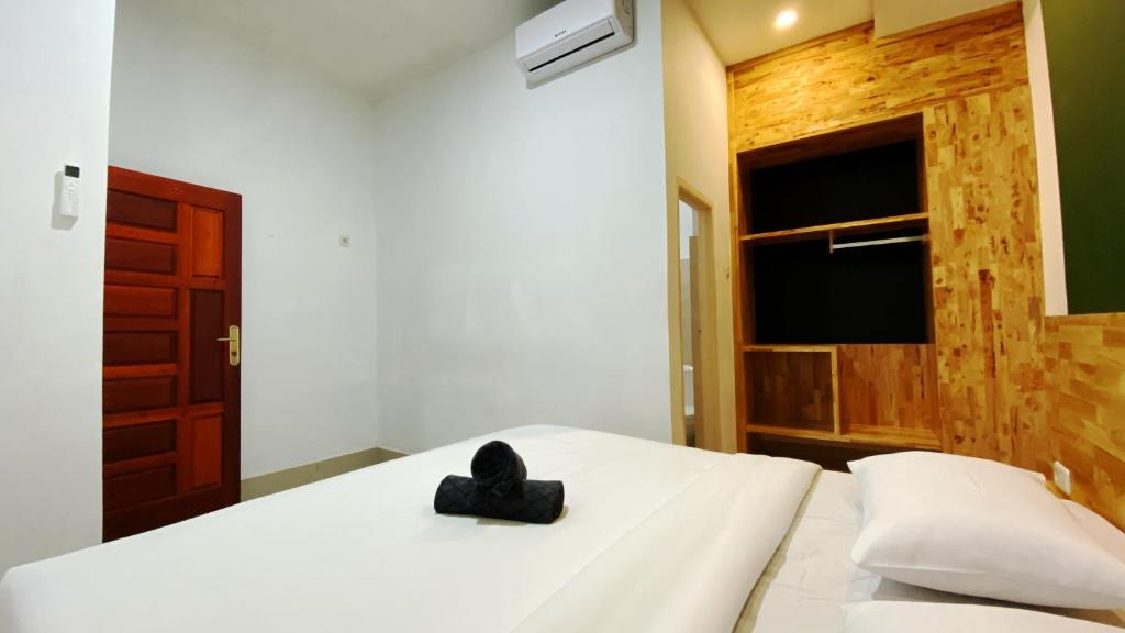 Postel nebo postele na pokoji v ubytování D'Hills Hotel
