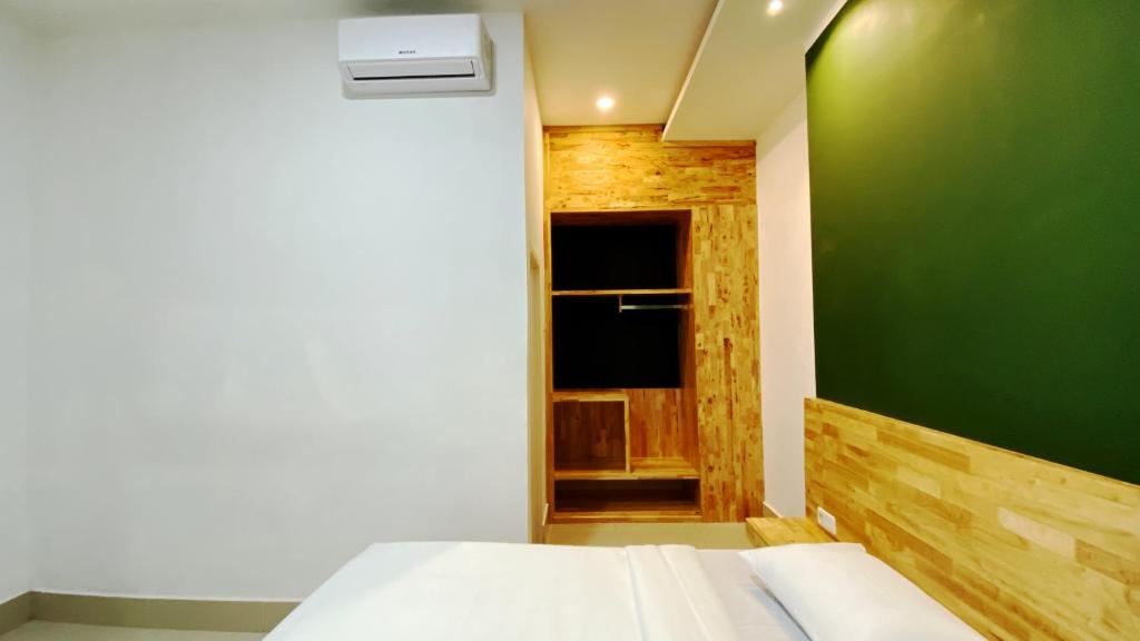 Postel nebo postele na pokoji v ubytování D'Hills Hotel