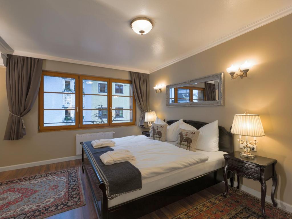 Postel nebo postele na pokoji v ubytování Schneider Hof Boutique-Hotel Garni Superior