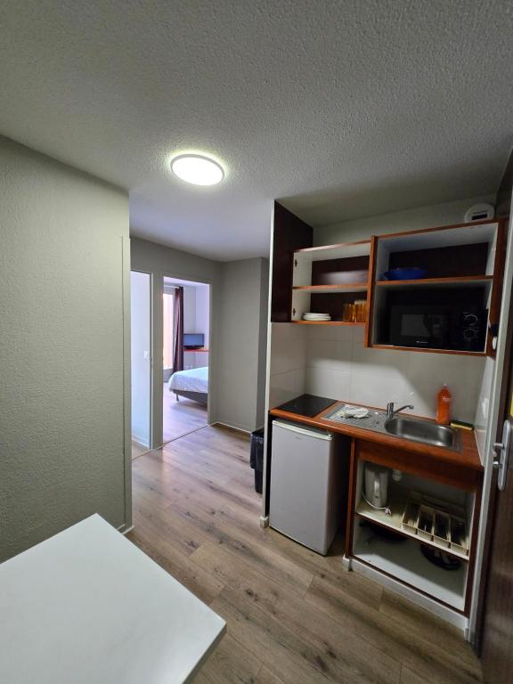 Postel nebo postele na pokoji v ubytování Geneva Residence