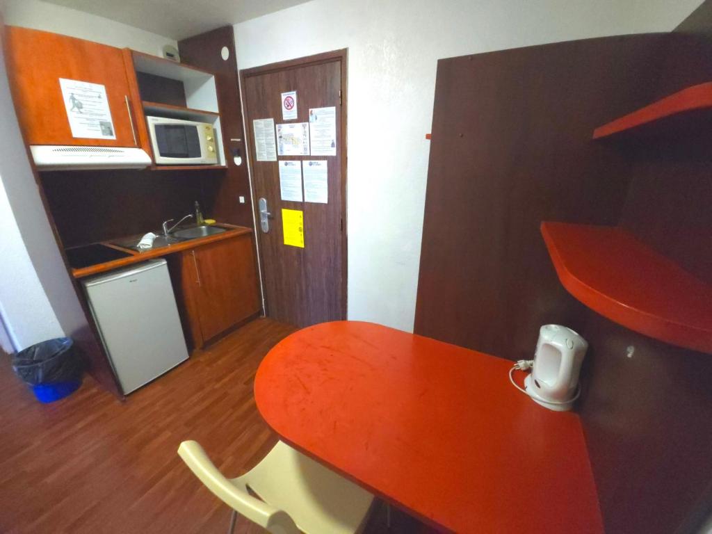 Kuchyň nebo kuchyňský kout v ubytování Geneva Residence