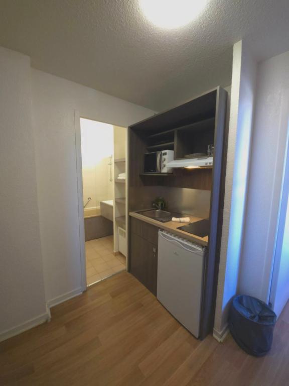 Kuchyň nebo kuchyňský kout v ubytování Geneva Residence