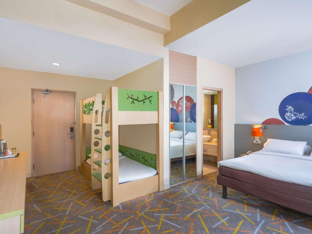 Voodi või voodid majutusasutuse Ibis Styles Malang toas