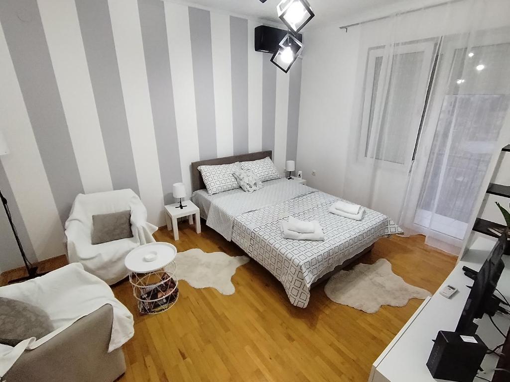 Postel nebo postele na pokoji v ubytování Apartman Nataly 2