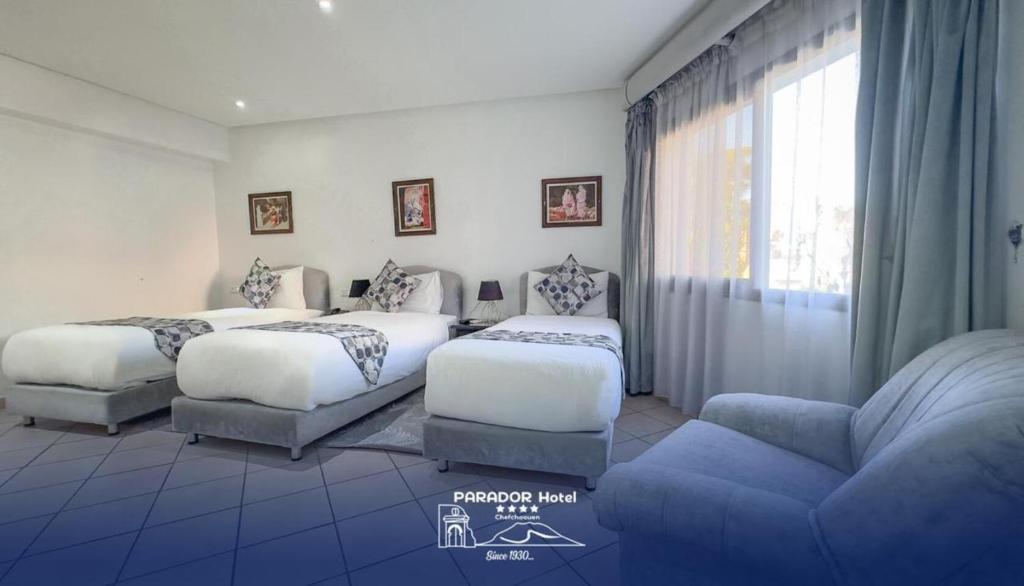 Postel nebo postele na pokoji v ubytování Hotel Parador