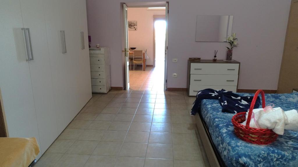 A bed or beds in a room at Appartamento La Chiesetta