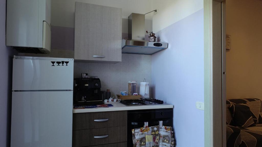 A kitchen or kitchenette at Appartamento La Chiesetta