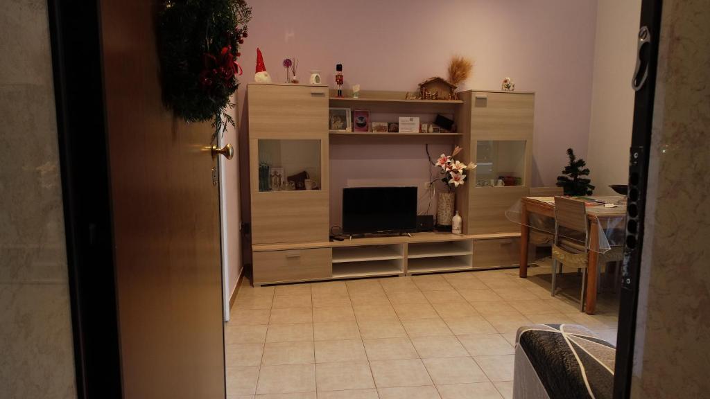 A television and/or entertainment centre at Appartamento La Chiesetta