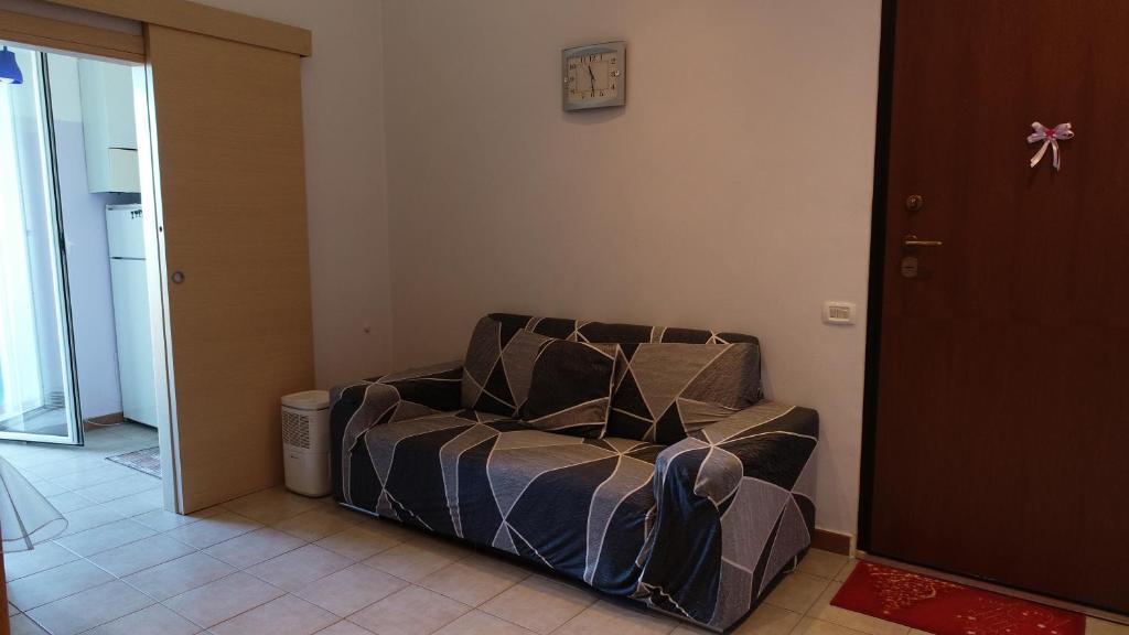 A bed or beds in a room at Appartamento La Chiesetta