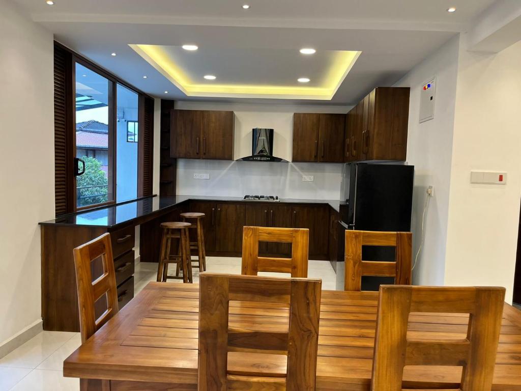 Kuchyň nebo kuchyňský kout v ubytování Kandy Breeze City Hotel