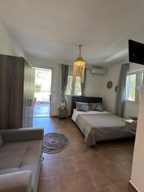 Postel nebo postele na pokoji v ubytování Thekla Guesthouse