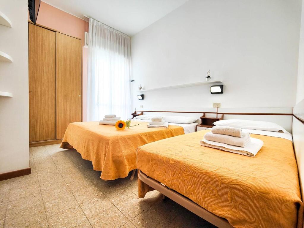 Postel nebo postele na pokoji v ubytování HOTEL LEA B&B Pensione Completa