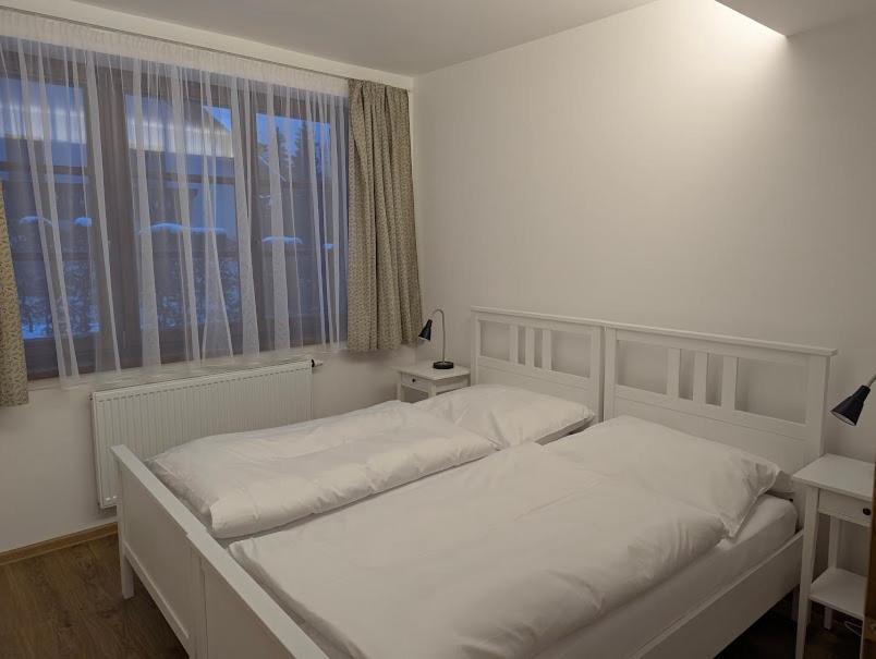 Postel nebo postele na pokoji v ubytování Pension Aspen