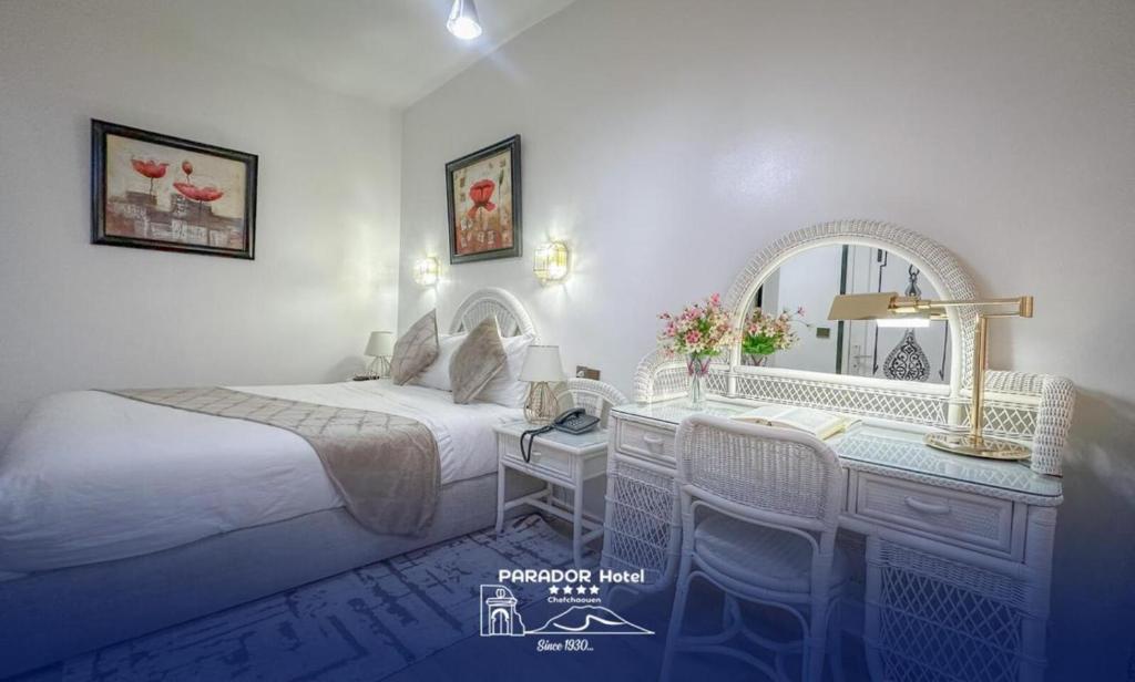Postel nebo postele na pokoji v ubytování Hotel Parador