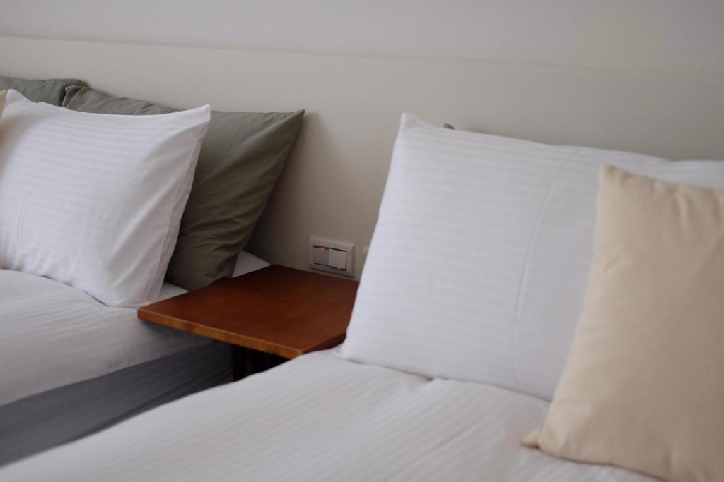 Postel nebo postele na pokoji v ubytování Yueshe House