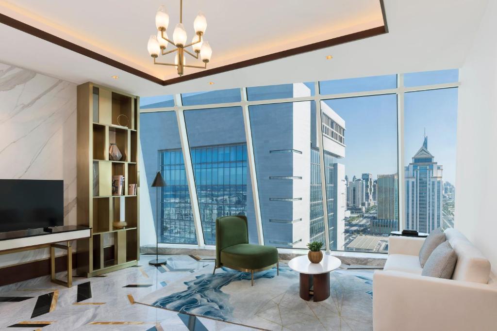 TV in/ali zabaviščno središče v nastanitvi Velero Hotel Doha Lusail