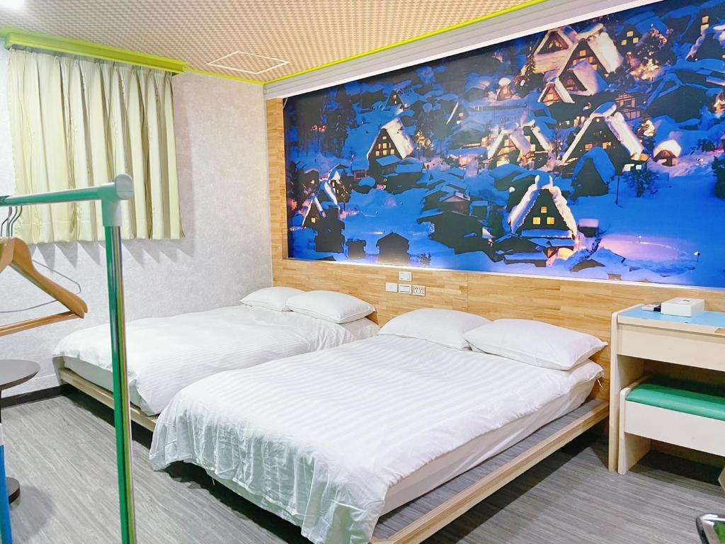 Postel nebo postele na pokoji v ubytování Clover house-自助式無人旅店