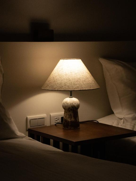 Postel nebo postele na pokoji v ubytování Yueshe House