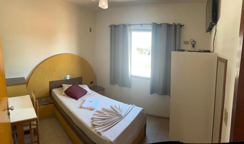 Postel nebo postele na pokoji v ubytování HOTEL LAREIRA