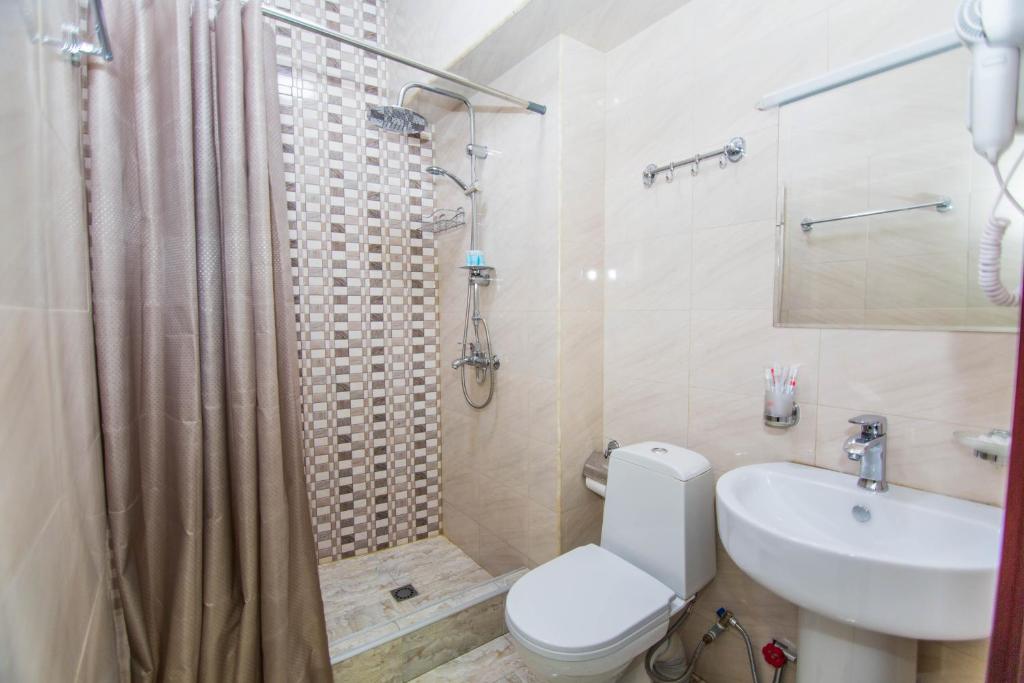 Koupelna v ubytování Hotel Care Inn