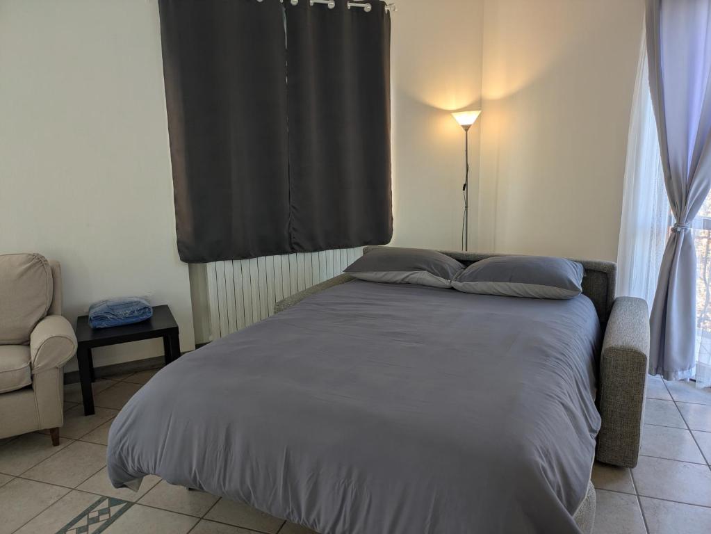 Postel nebo postele na pokoji v ubytování CAV Casa del vecchio faggio - 4 stelle - Nebbiuno Lago Maggiore