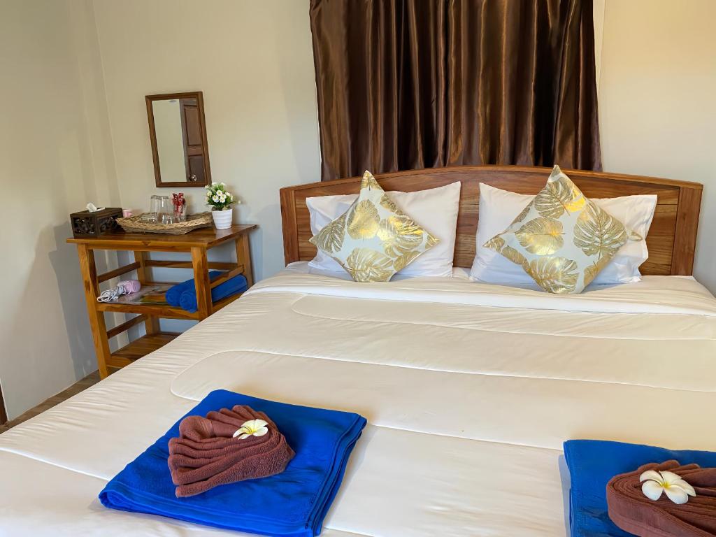 Postel nebo postele na pokoji v ubytování Relaxing House Koh Yao Yai