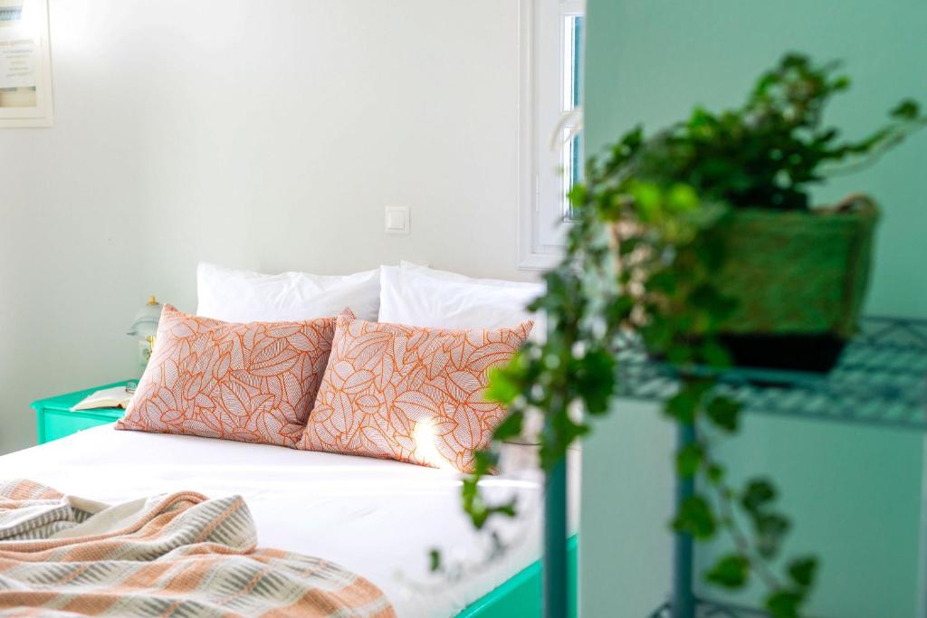 Postel nebo postele na pokoji v ubytování Sahara Beach Apartments - Kastraki