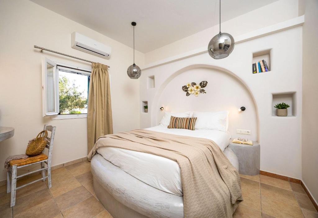Postel nebo postele na pokoji v ubytování Sahara Beach Apartments - Kastraki