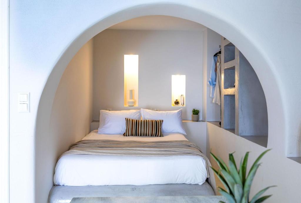 Postel nebo postele na pokoji v ubytování Sahara Beach Apartments - Kastraki