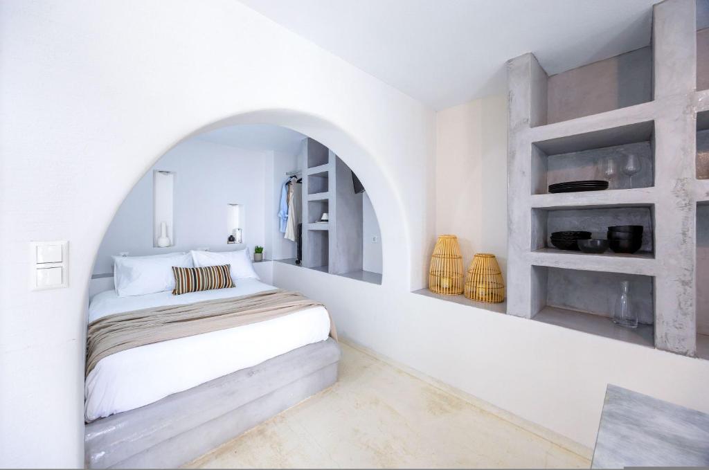 Postel nebo postele na pokoji v ubytování Sahara Beach Apartments - Kastraki